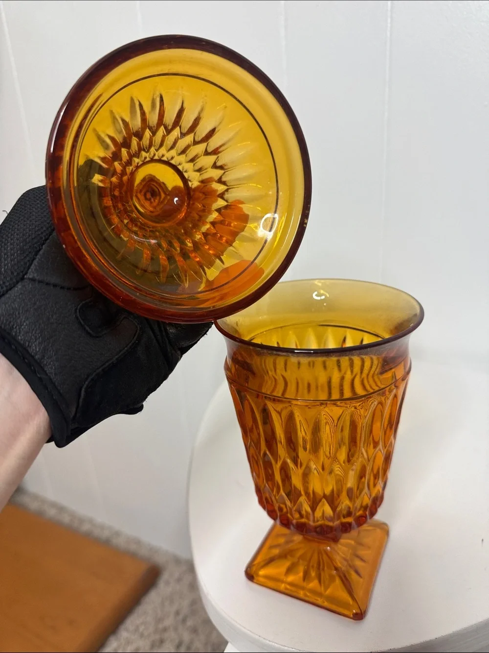 Orange glass pedestal candy dish
